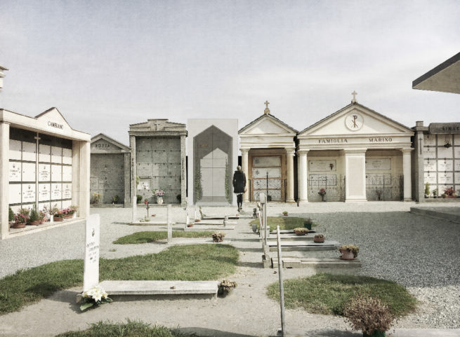 Cimitero con cappelle familiari e lapidi su vialetto in ghiaia.